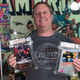 Joshua Entin holds high-grade copies of the NES games Mike Tyson’s Punch-Out and Metroid.